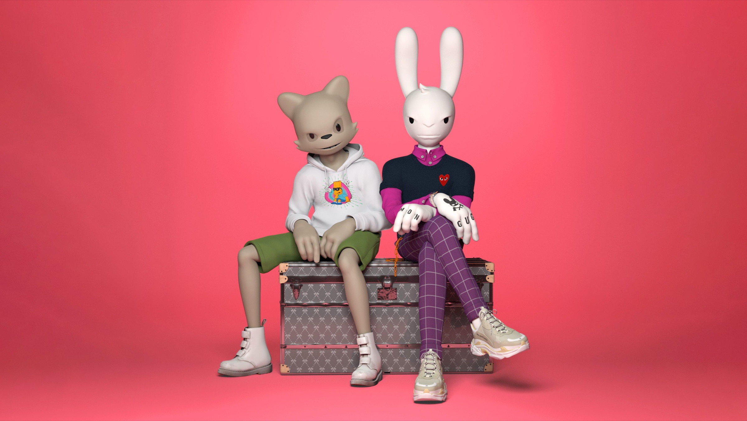Janky and Guggimon seated together on a patterned trunk against a vivid pink backdrop.